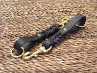 Short leather dog leash (pull tab leash).
