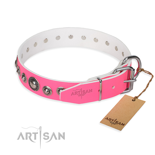 Genuine leather dog collar made of gentle to touch material with reliable studs